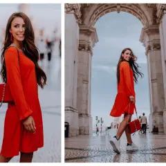 Elegancka, czerwona sukienka i torebka tworzą idealną stylizację na uroczystość rodzinną. Kobieta w ruchu pod łukiem.