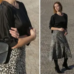 Elegancka czarna bluzka do spódnicy w panterkę, idealna na co dzień i wieczór. Stylizacja z czarną torebką na łańcuszku.