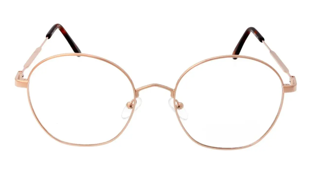 Okrągłe, metalowe okulary w kolorze różowego złota. Idealne, by dowiedzieć się, jak dopasować okulary do twarzy.