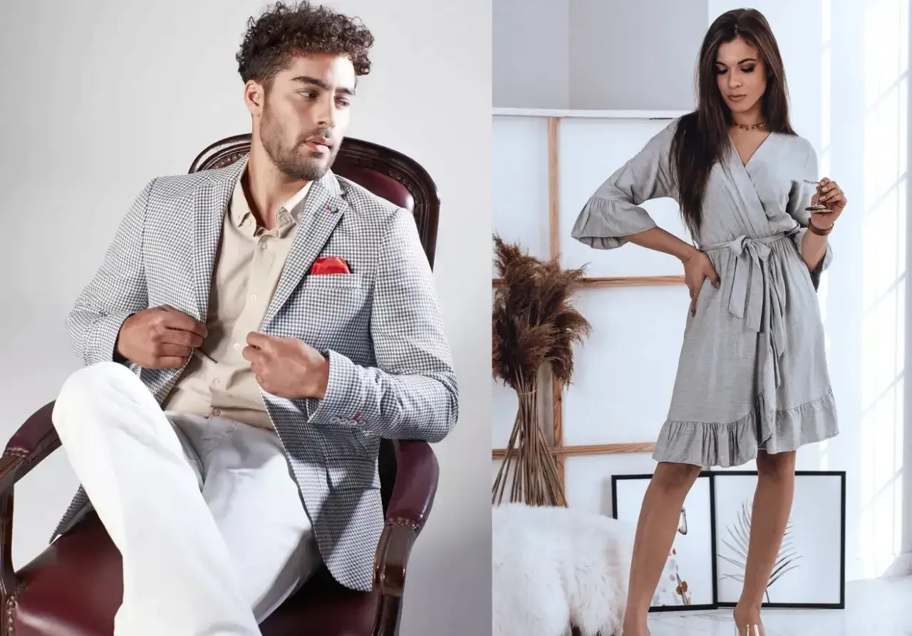 Mężczyzna w marynarce w kratkę i kobieta w szarej sukience prezentują elegancki styl biznesowy.